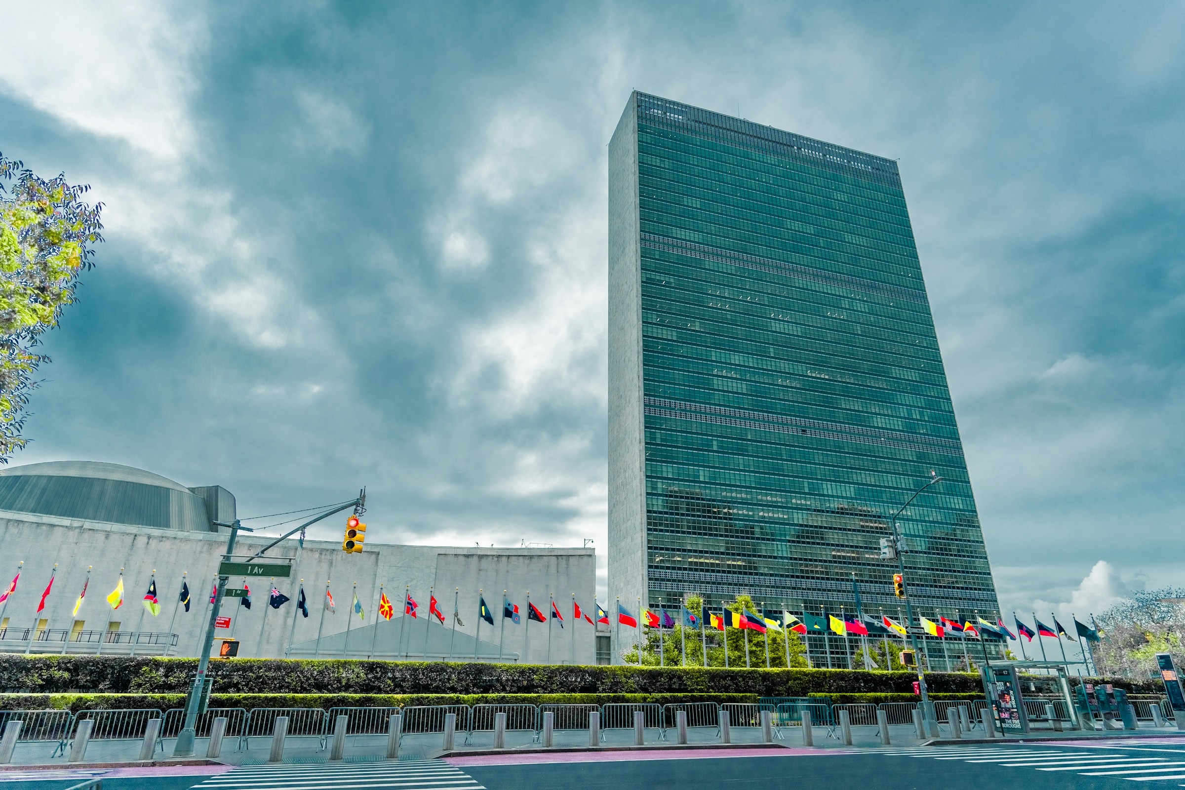 Official diplomatic delegation with flags